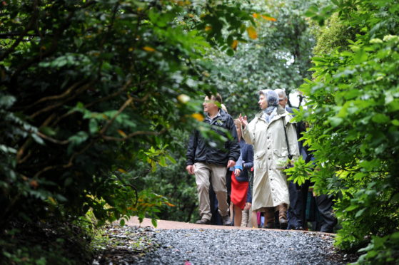 HRH The Princess Royal tours: Inverewe Gardens, Poolewe guided by Kevin Ball, Head Gardener.