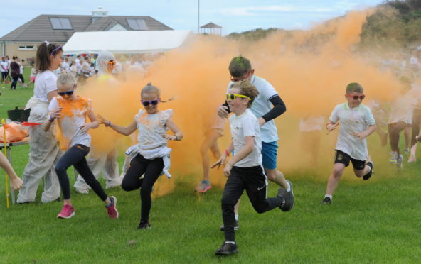 Participants take part in the Colour Run on Saturday held as part of the Hopeman Gala