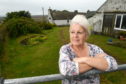 Janet Cowin of Braeval Farm Cottage of the Rumster anti-windfarm group whose outlook willbe dominated by massive turbines running along the horizon.