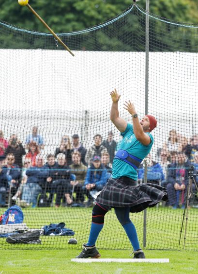 Vlad from Czechia competes in the mens Scots' Hammer. Picture by Sandy McCook