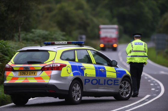 Police at the scene on the A9.