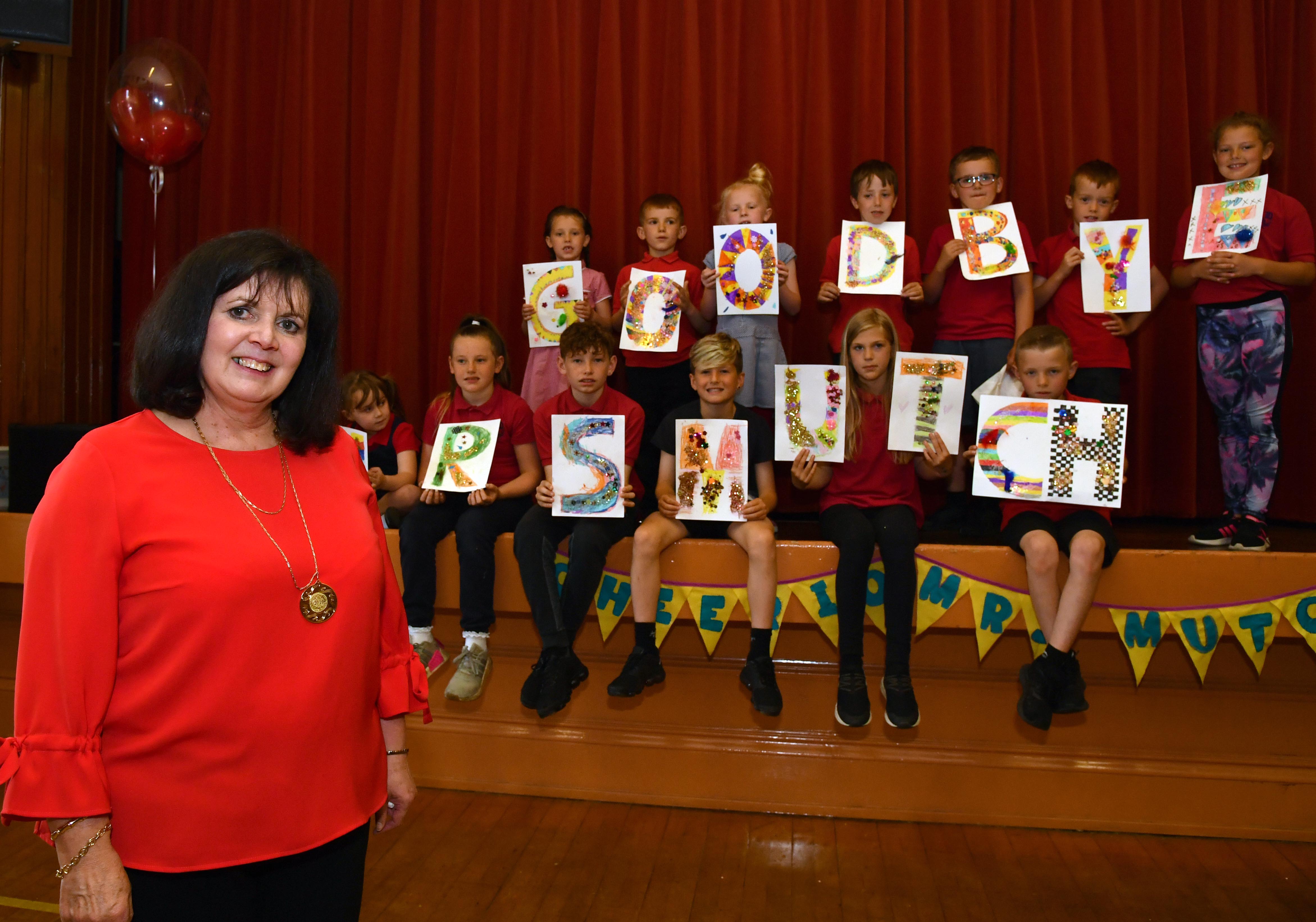 NEW DEER HEAD TEACHER WILMA MUTCH GETS A SEND OFF FROM HER PUPILS AFTER 40 YEARS OF SERVICE