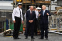 Prime Minister Boris Johnson visits HMS Victorious with Defence Secretary Ben Wallace accompanied by Commander Justin Codd at HM Naval Base Clyde in Faslane, Scotland.