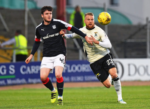 Daniel Higgins (left) in action against Caley Thistle in 2017.