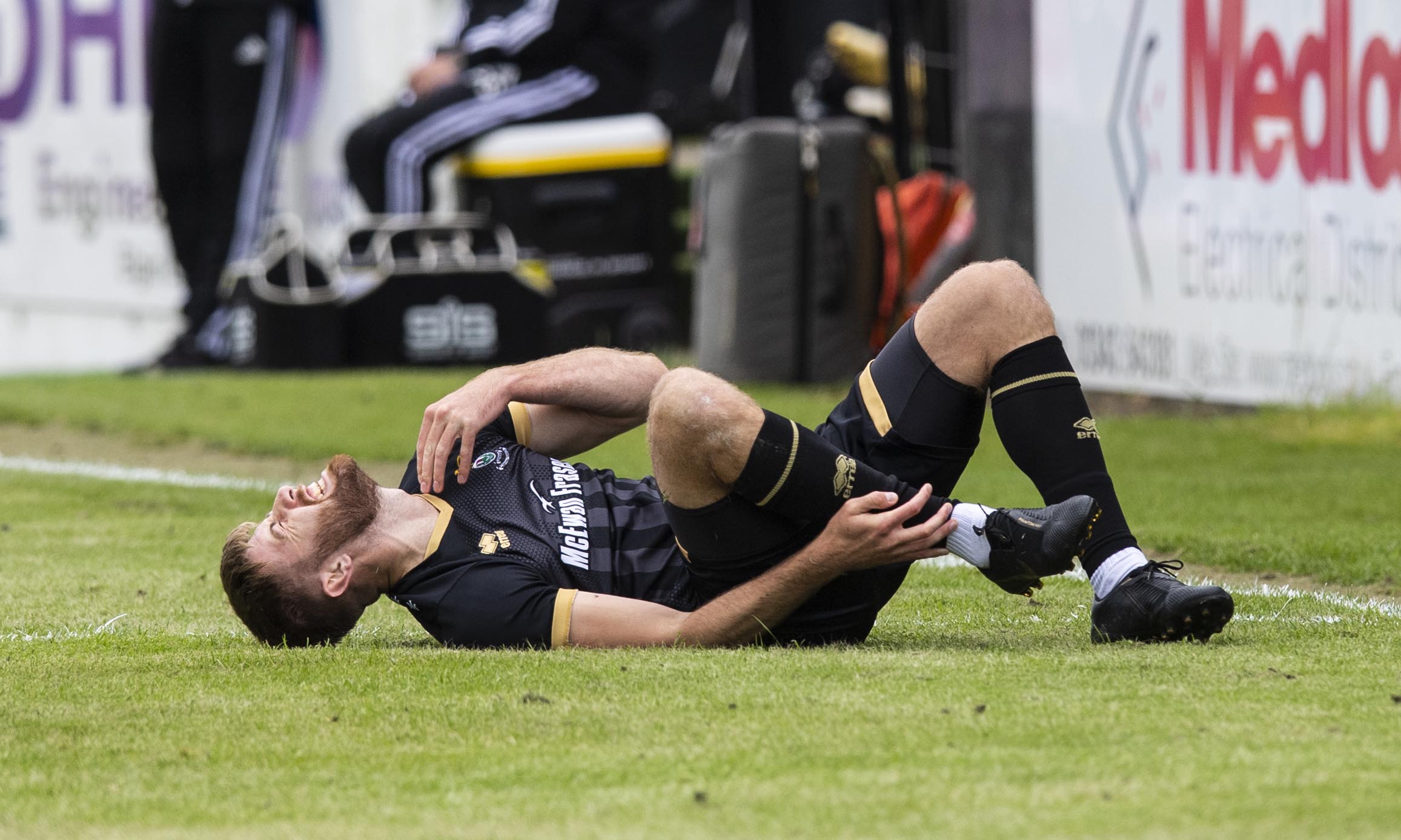 Shaun Rooney was injured just minutes into the game against Aberdeen.
