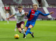 08/07/19 ANGUS BEITH BENEFIT MATCH
HEARTS v INVERNESS CT
TYNECASTLE PARK - EDINBURGH
Hearts' Euan Henderson (L) competes with Coll Donaldson