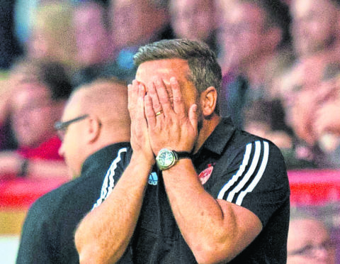 Aberdeen manager Derek McInnes can't hide his disappointment after conceding late on.