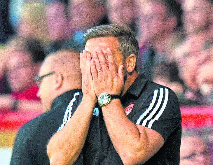 Aberdeen manager Derek McInnes can't hide his disappointment after conceding late on.