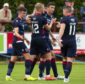 The Ross County players celebrate Ross Stewart's opening goal