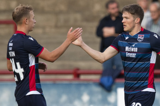Ross County's Blair Spittal celebrates his goal to make it 4-0 with Harry Paton.