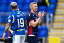 Ross County’s Billy McKay applauds the fans at full time