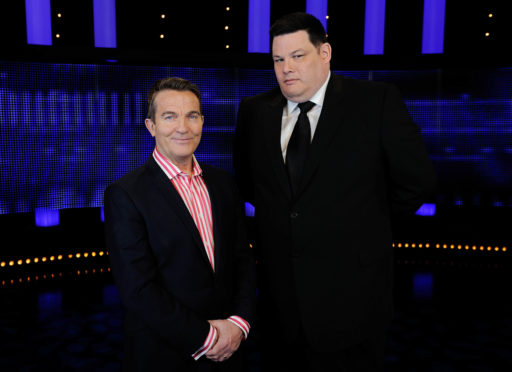 Host Bradley Walsh with Chaser Mark Labbett