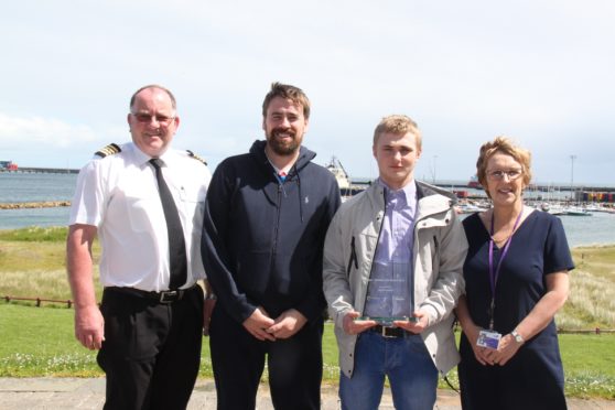 Harbourmaster John Forman, skipper Alexander Buchan, winner Kyle Rossiter and Centre manager Linda Hope