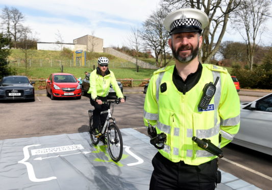 PC Scott Leslie and Road Policing Sergeant Peter Henderson at the launch of Operation Close Pass at Duthie Park,