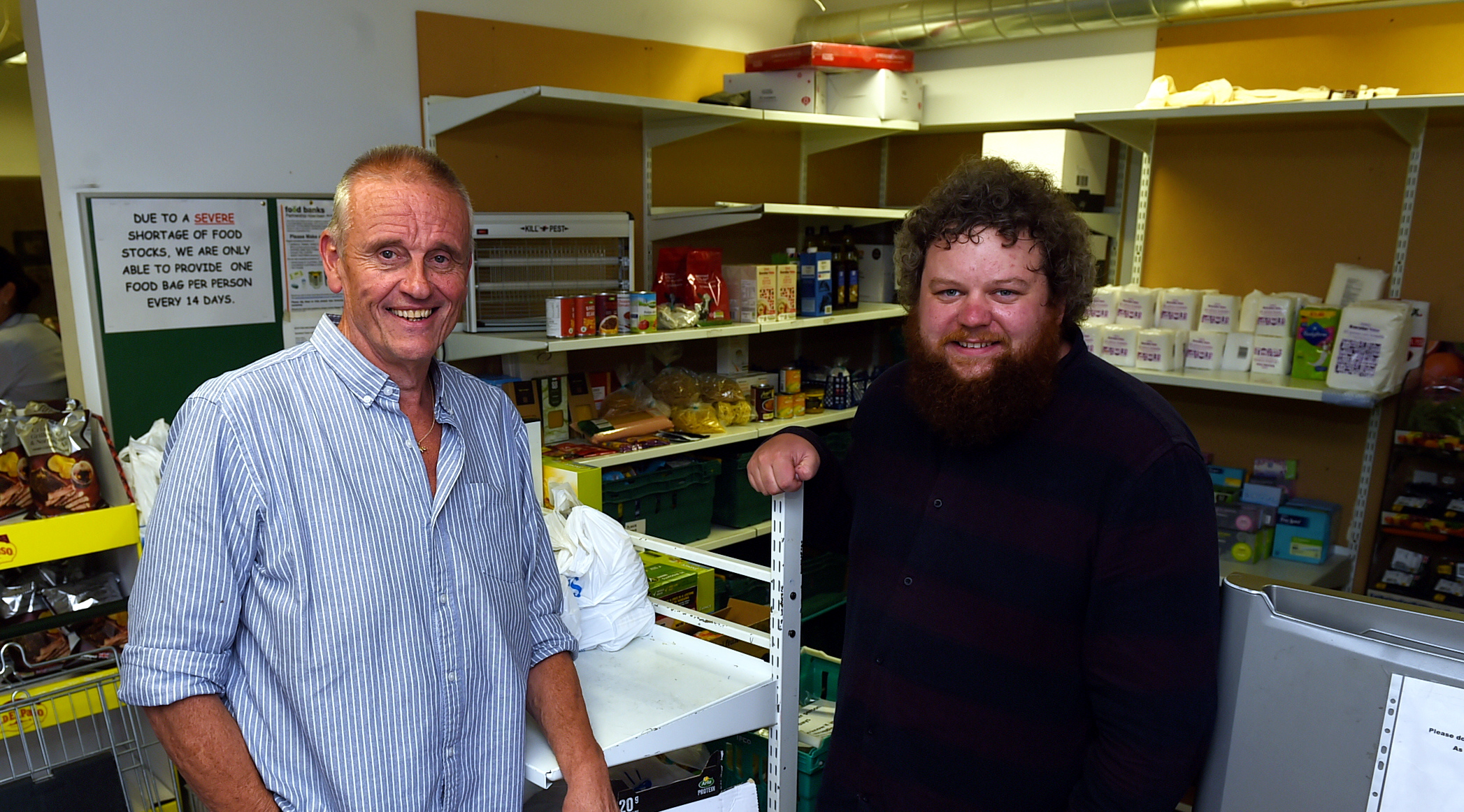 Foodbank at CFINE. 
Dave Simmers, left,  and  Graeme Robbie.