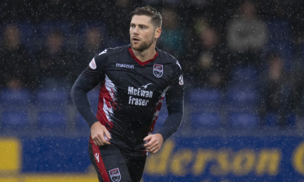 Ian Vigurs in action for Ross County.