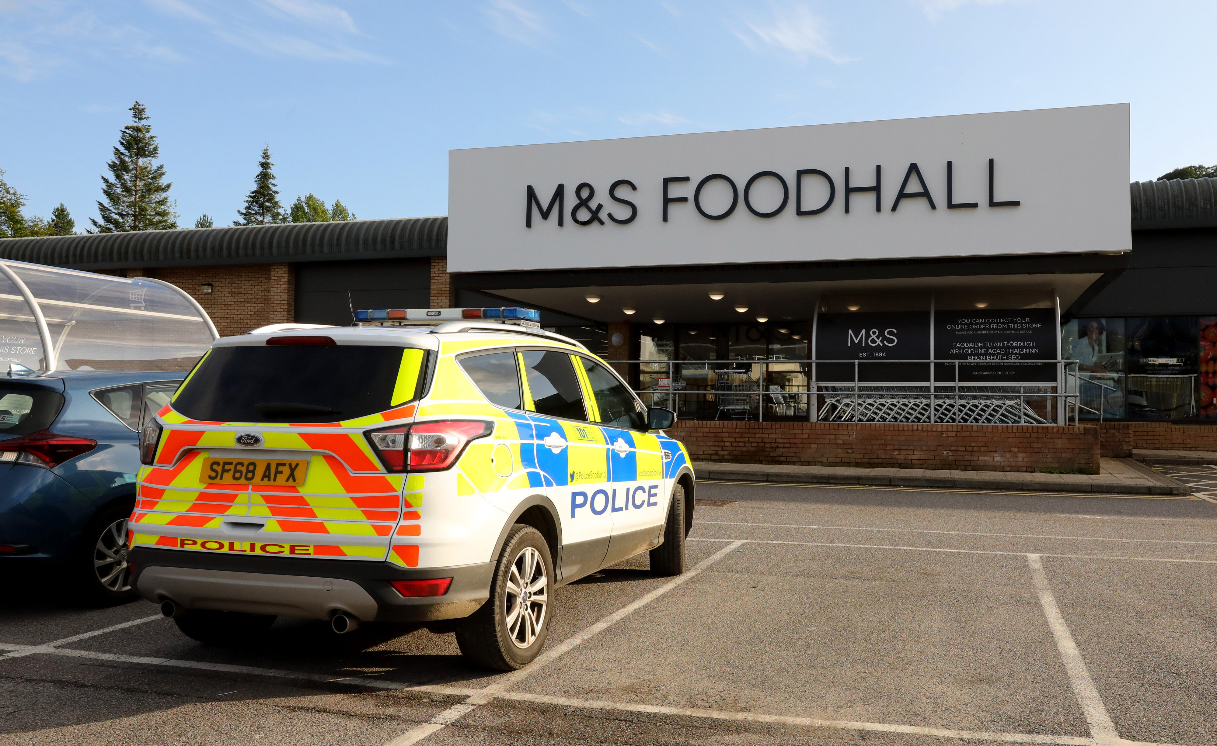 Police outside the M&S store in Oban.