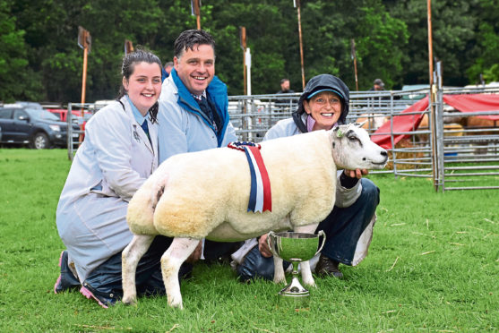 Graham and Fiona Burke, with daughter Rachel, at the 2019 Scottish National Beltex Show.