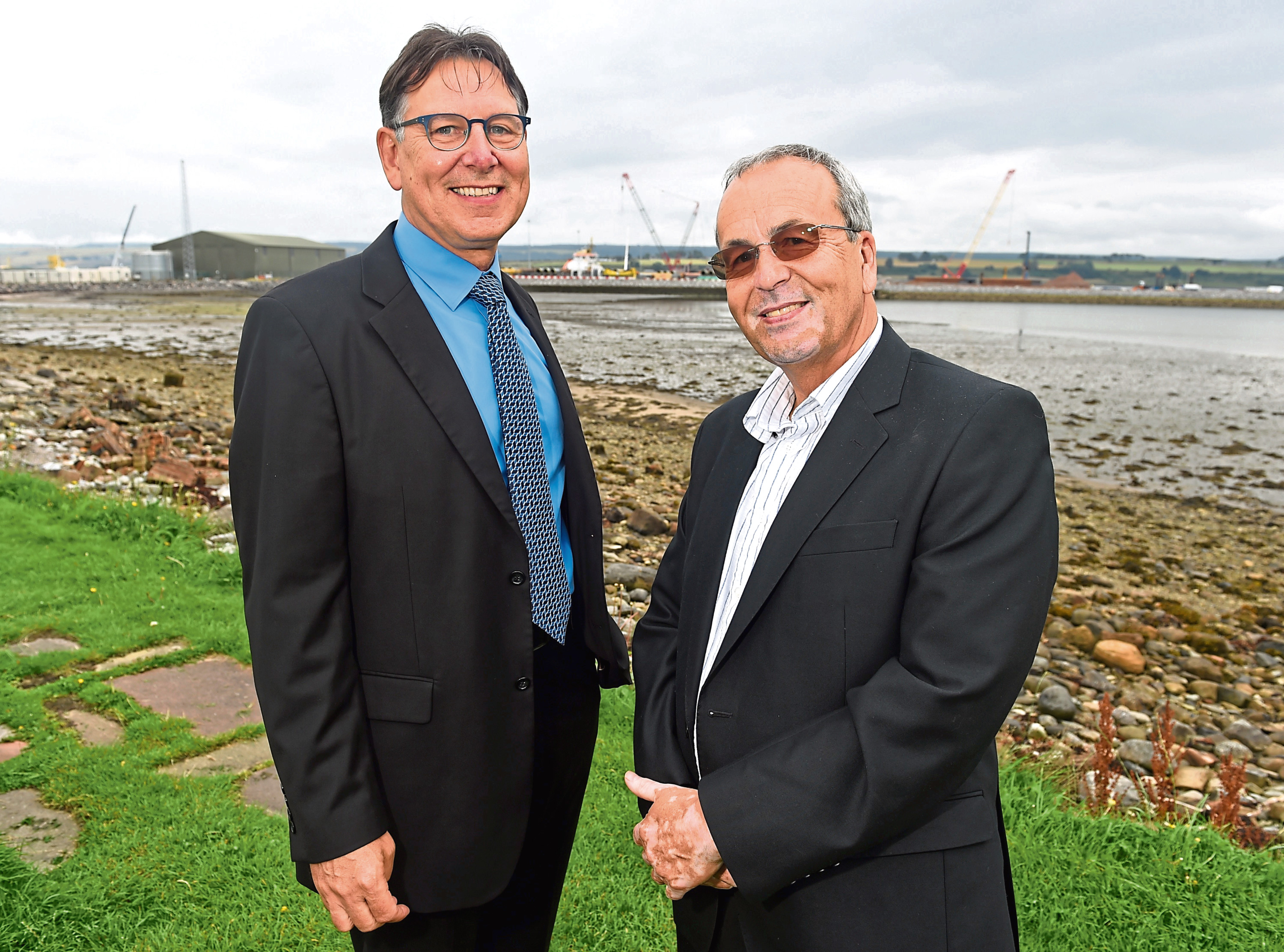 Bob Buskie, Chief Executive of the Cromarty Firth Port Authority and Roy MacGregor, Chairman of Global Energy. Picture by Sandy McCook