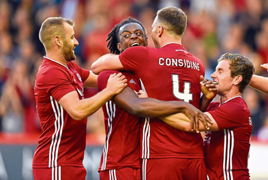 Aberdeens Greg Leigh celebrating