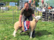 Neil Montgomery with his champion Cheviot gimmer.