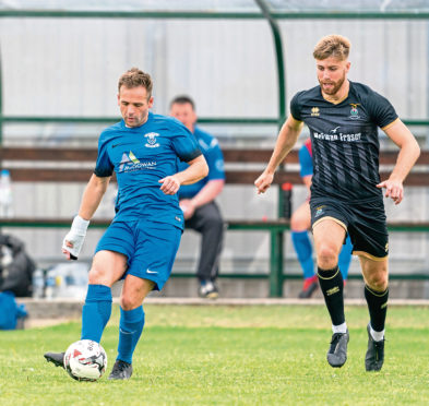 Strathspey Thistle's Andrew Miller and Caley Thistle's Shaun Rooney