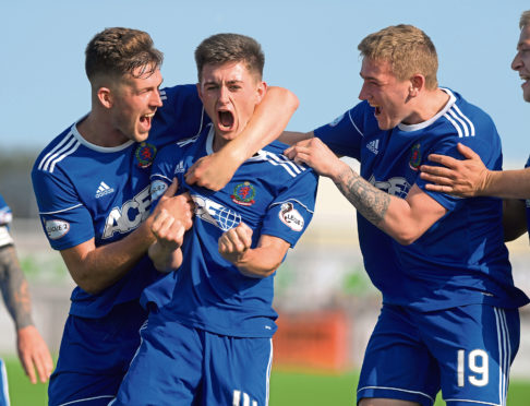 Cove's Declan Glass scores the winning goal in the last few minutes. Picture by Kath Flannery