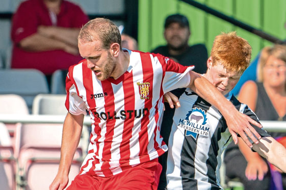 Formartine's Garry Wood and Fraserburgh's Owen Cairns