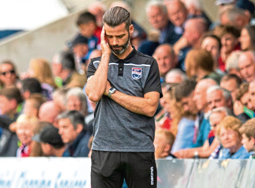 Ross County manager Stuart Kettlewell shows his frustration