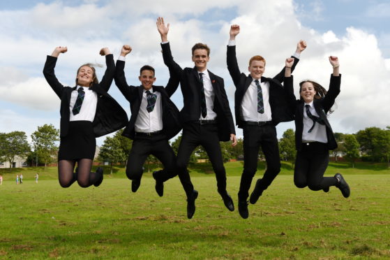 Pupils from Westhill Academy, Aberdeenshire, received their exam results.
Picture of (L-R) Emma Coull, Jamie Watt, Kieran Pirie, Matthew Mills, Caitlin Watt.

Picture by KENNY ELRICK 06/08/2019