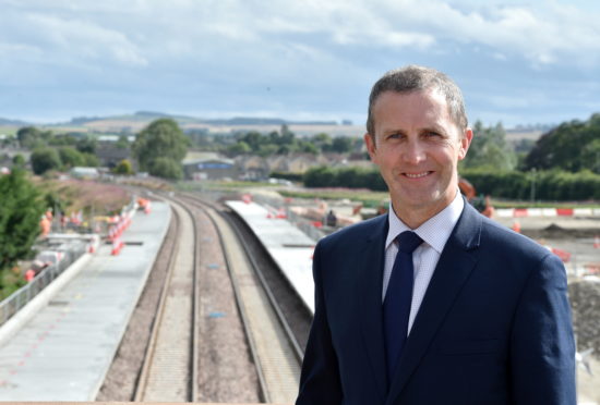 Michael Matheson at the Kintore station site.