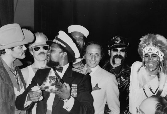 Henri Belolo, third from the right, with Village People