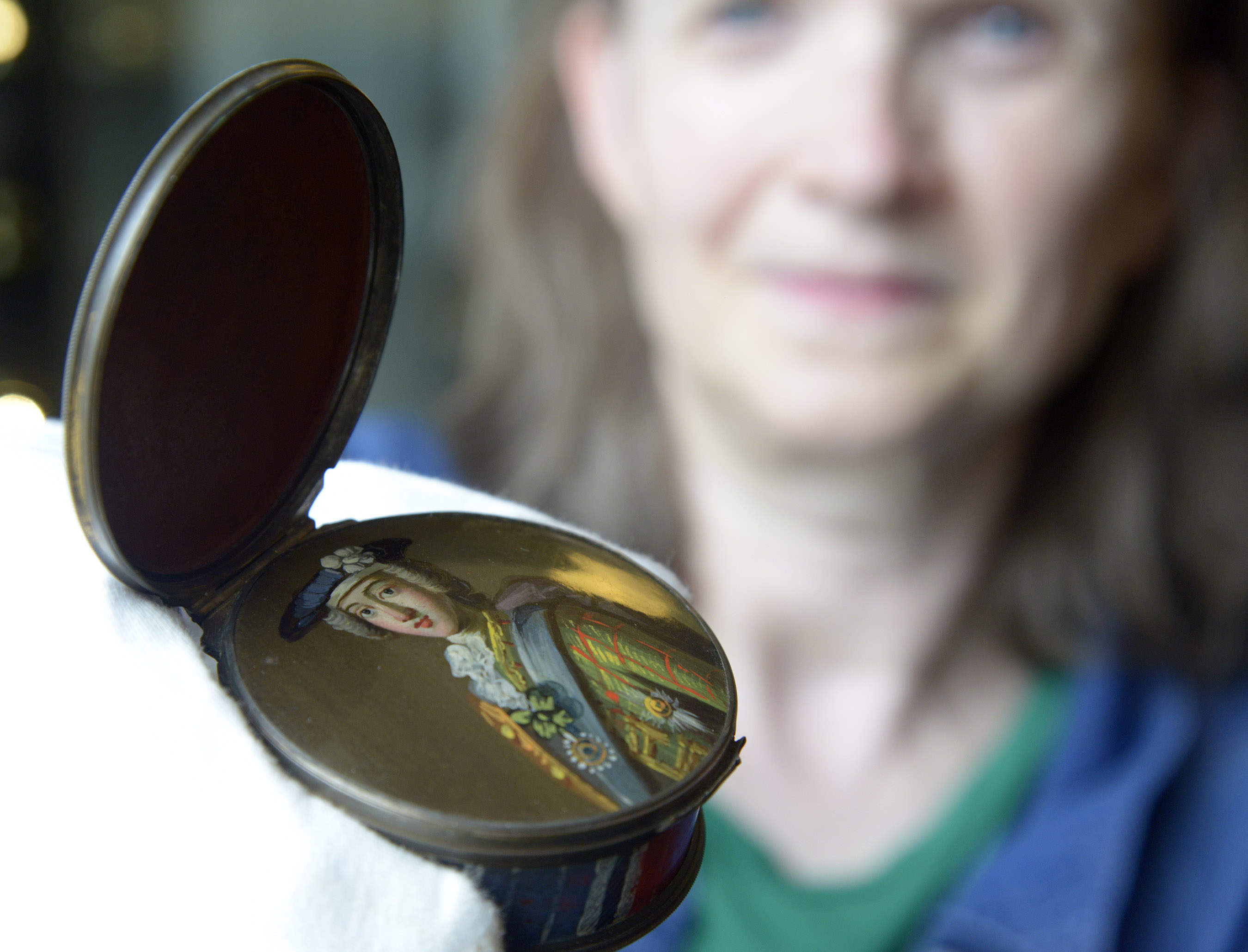 Volunteer and shop manager, Sonja McLachlan shows off the finely enamelled ‘Hidden Portrait snuff box which is now on display at Fort William’s West Highland Museum . PICTURE IAIN FERGUSON, THE WRITE IMAGE
