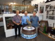 Left to right we are Stan Earl, Bob Dickson and Peter Page of the Port of Lowestoft Research Society with the Prunier Herring Trophy