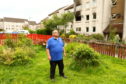 George Berry on the waste ground where he wants argyll and bute council to convert in to an area for emergency services to attend and deal with incidents which could save lives picture kevin mcglynn