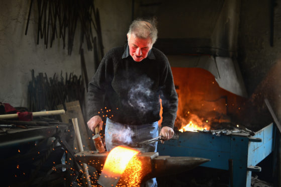 Calum Stealag Macleod in his workshop in 2014.