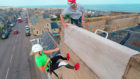 More than 70 people abseiled down the side of the Lossiemouth landmark.