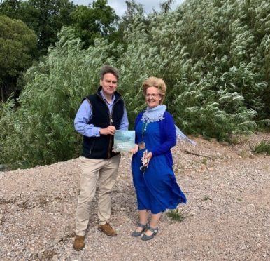 Kay Jackson and Mark Bilsby on the banks of the Spey.