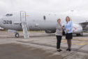 Minister of Defence Procurement Anne-Marie Trevelyan MP and Ms Tone Skogen, the Norwegian State Secretary in the Minitry of Defence at the front of a US Navy Poseidon P8-A aircraft before their flight.