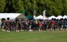 Massed pipe bands at Aboyne Highland Games