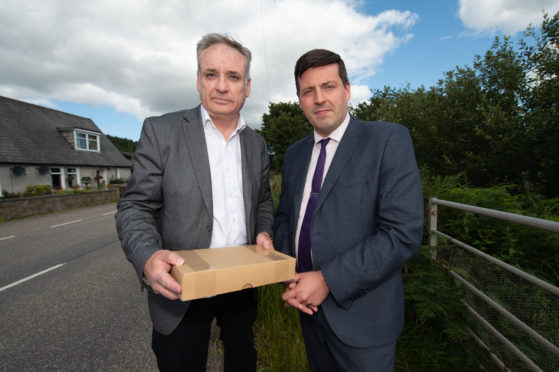 Moray MSP Richard Lochhead and Scottish Government business minister Jamie Hepburn in Orton, south of Fochabers.