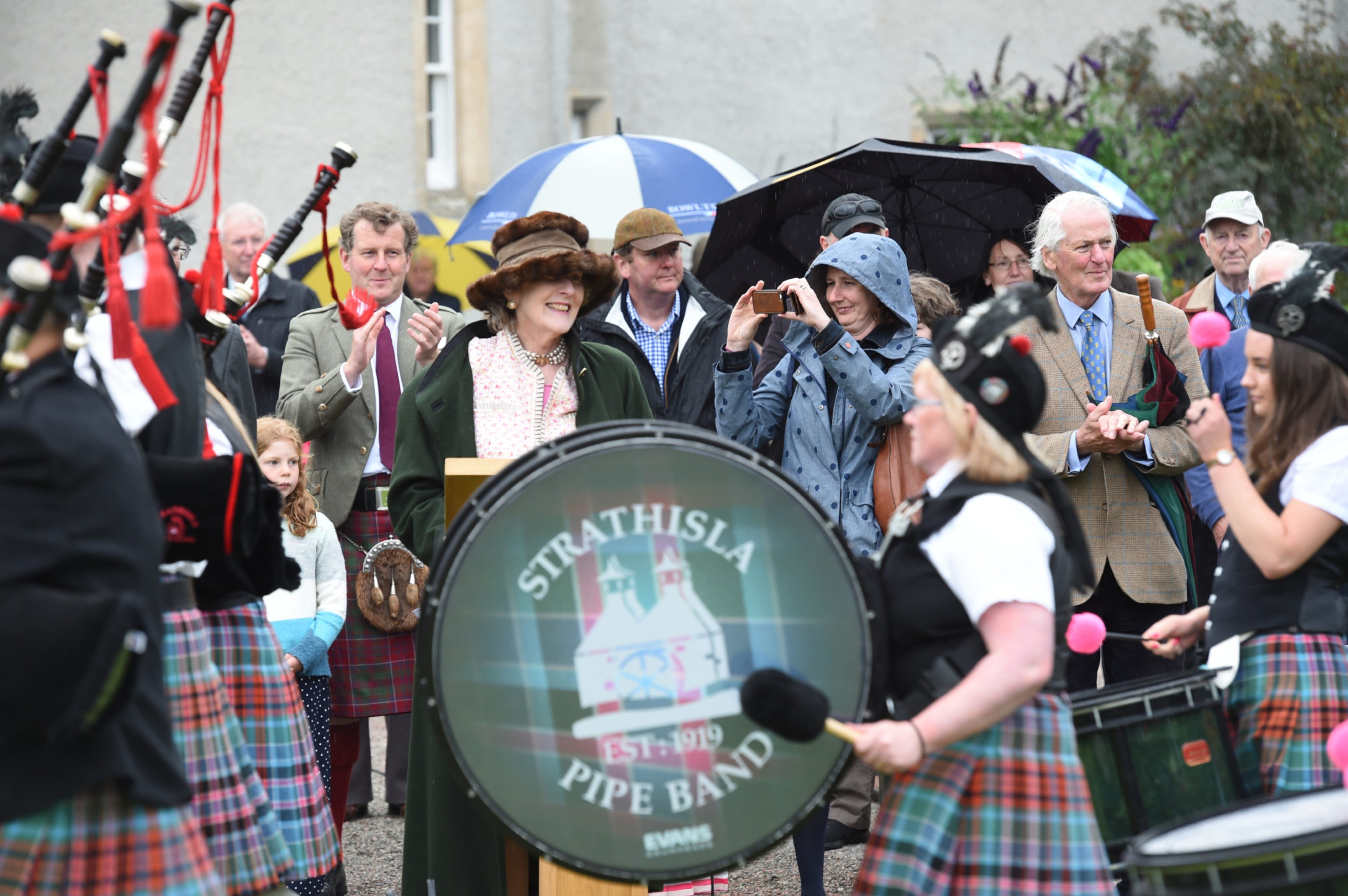 Departing Lord Lieutenant of Banffshire Clare Russell holds a retirement garden party for the community at Ballindalloch Castle. The event is also being used to celebrate the centenary of the Keith-based Strathisla Pipe Band


Pictures by JASON HEDGES