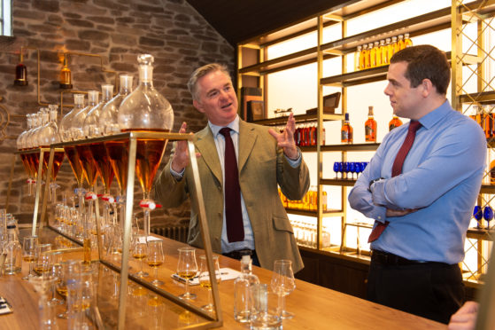 Scotland Office minister Colin Clark and Moray MP Douglas Ross.