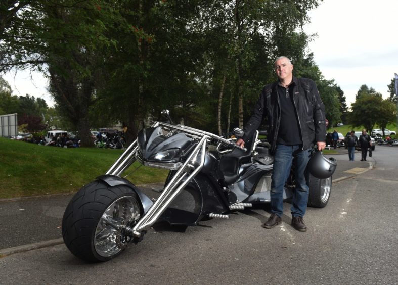Mike Bisset from Aberdeen next to his Kaszpir Trike
Pictures by JASON HEDGES