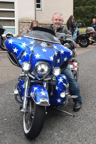 Assistant Director of Dunedin Chapter in Aberdeen and ride out lead biker today Stewart Willox is pictured on his Harley Davidson 2000 Electra Glide Ultra Classic.
Pictures by JASON HEDGES