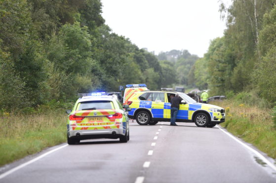 Police at the scene of the incident between Glenfinnan and Fort William on the A830. Picture by Sandy McCook