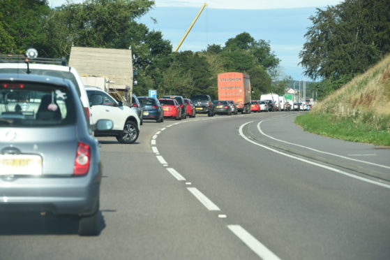 Traffic queues on the A96 following the three-vehicle accident.