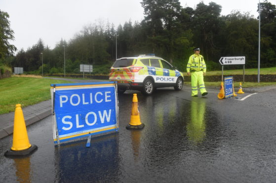 Police closed the A98 after the accident.