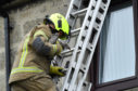 The gull was brought safely down from the roof by Fraserburgh fire fighters