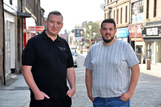 SANDY GARVOCK (L) AND AARON RITCHIE OF MEN UNITED.